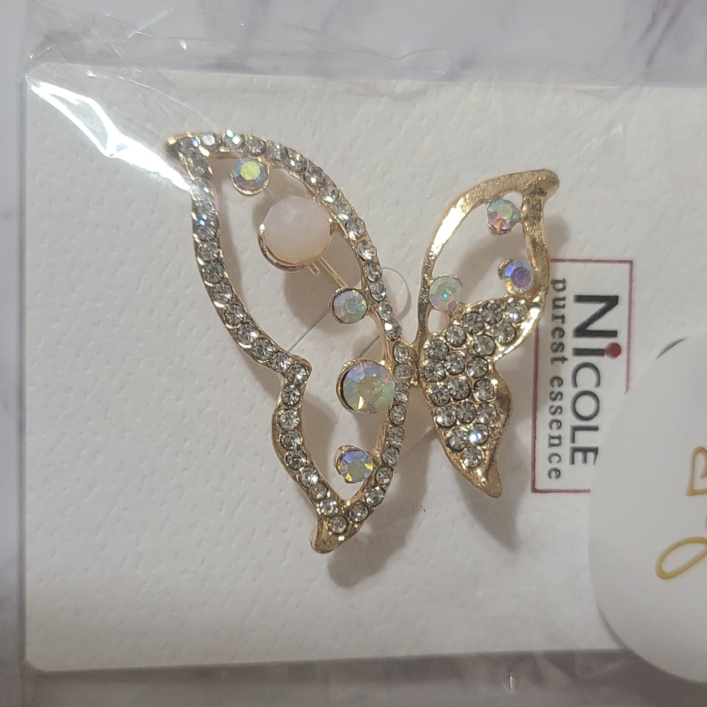 TWO CLOTHING PINS